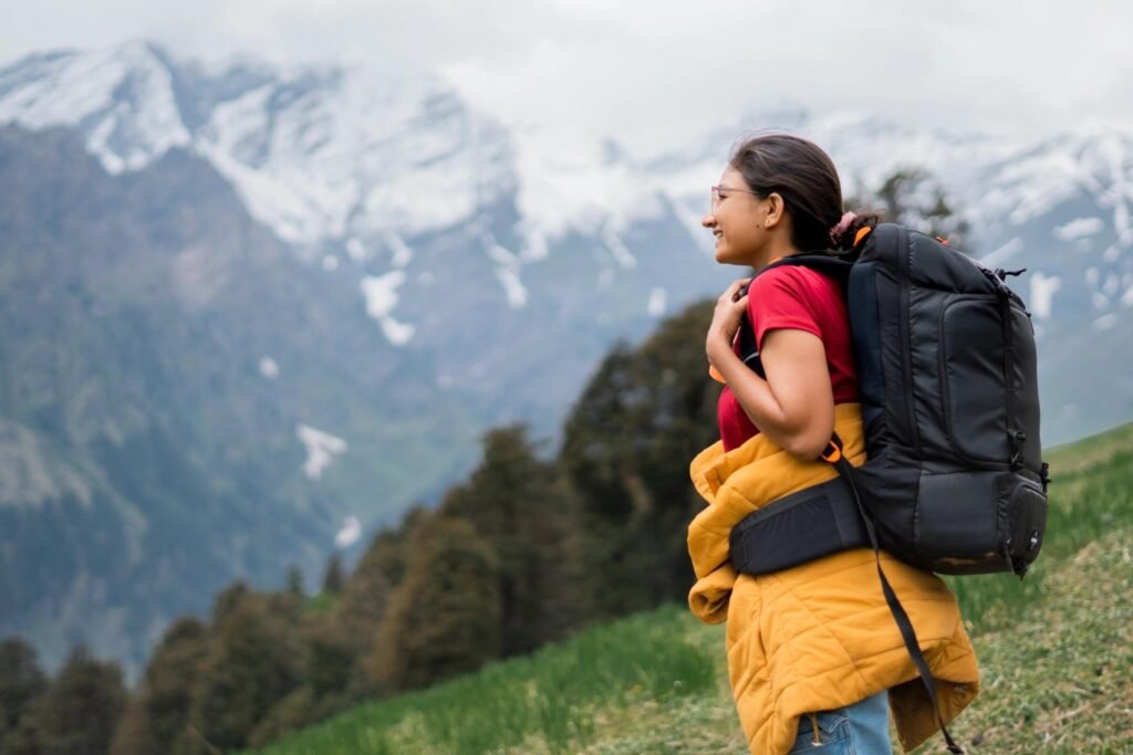 Backpacker enjoying an affordable mountain trip in Himachal Pradesh