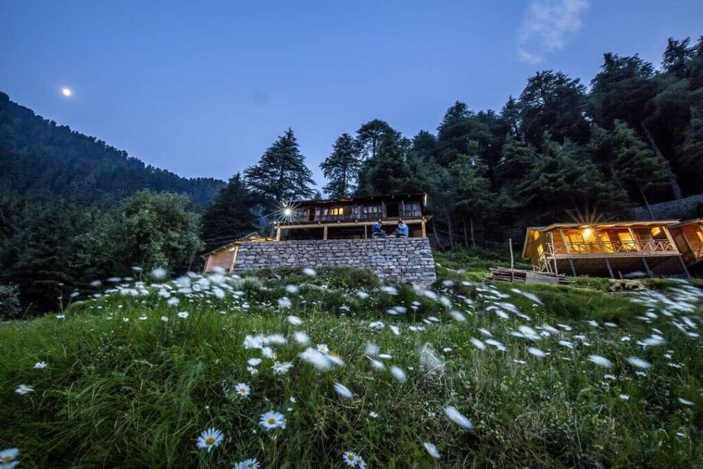 Couple enjoying a honeymoon stay in Dalhousie with panoramic mountain views