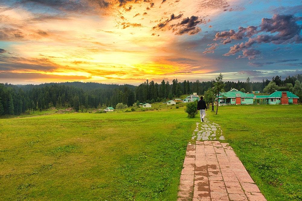 Golden sunset over Khajjiar meadow near Dalhousie in Himachal Pradesh