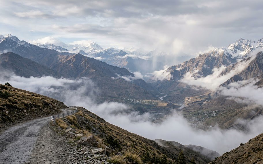 Clouds and mist changing the appearance of a Himalayan mountain landscape